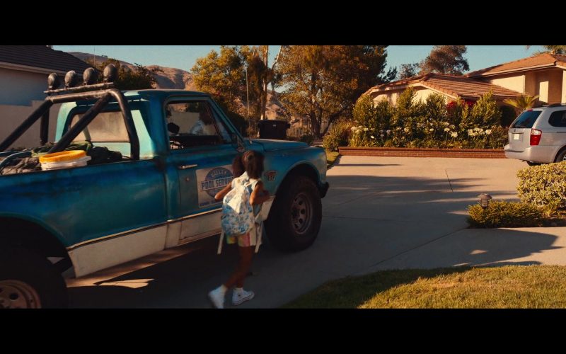 Converse White Shoes of Zion Broadnax as Paige in Day Shift (2022) (Image 1)
