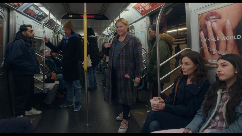Crunch Fitness and Nike Shoes in Kinda Pregnant (2025) (Image 12)