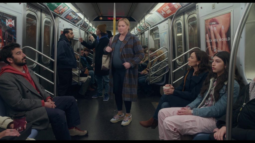 Crunch Fitness and Nike Shoes in Kinda Pregnant (2025) (Image 6)