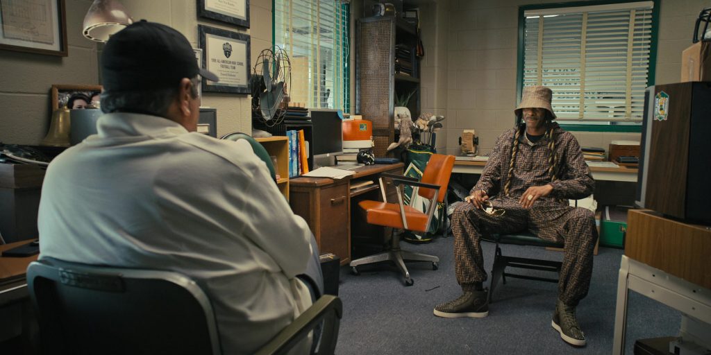 Fendi Jacket, Pants, Bucket Hat and Louboutin Sneakers Worn by Snoop Dogg as Jaycen Jennings in The Underdoggs (2024) (Image 13)