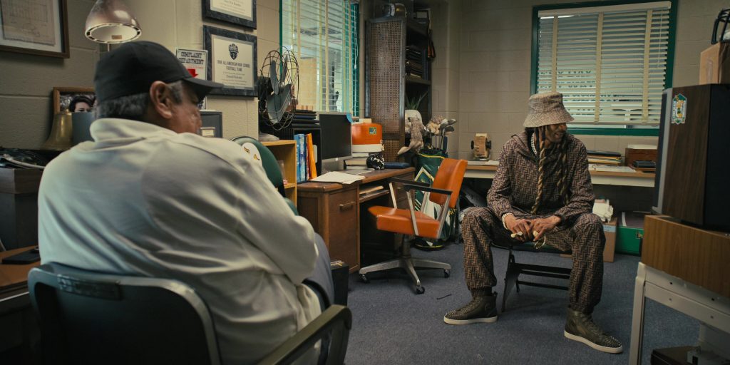 Fendi Jacket, Pants, Bucket Hat and Louboutin Sneakers Worn by Snoop Dogg as Jaycen Jennings in The Underdoggs (2024) (Image 9)
