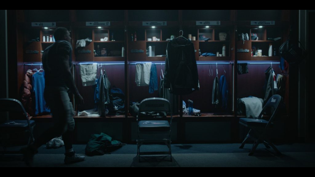 Gillette, Nike Shoes and Adidas Backpack in American Sports Story S01E10 “Who Killed Aaron Hernandez” (2024) (Image 1)