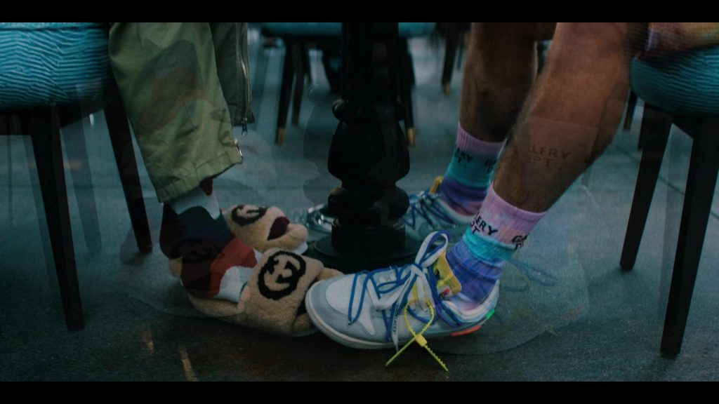 Gucci Furry Slides and Nike x Off-White Sneakers in You People (2023) (Image 2)