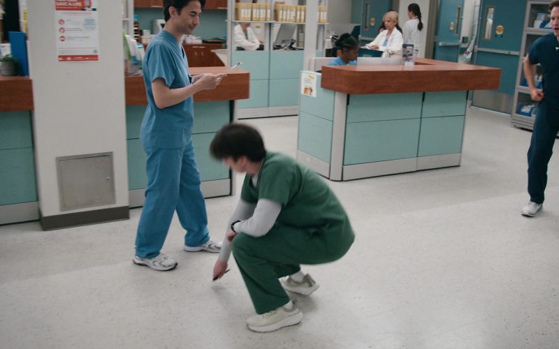 Hoka Arahi 7 running shoe in the Oat Milk -Barley colorway in St Denis Medical S02E03 “Get Me in the Pod, Brother” (2025) (Image 1)