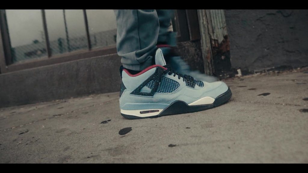 Jordan 4 by Nike x Travis Scott Blue Suede Sneakers in Sneakerheads S01E01 “100% Pure Adrenaline” (2020) (Image 1)