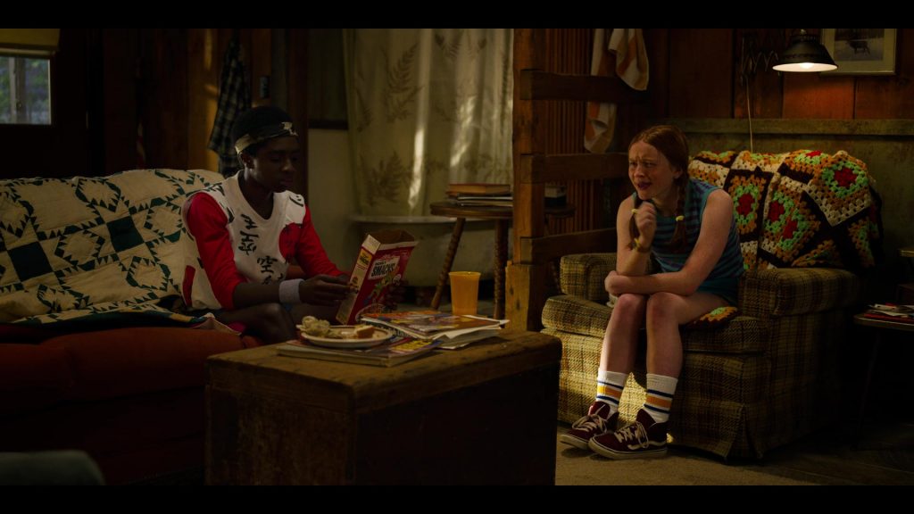 Kellogg's Honey Smacks Cereal Held by Caleb McLaughlin as Lucas Sinclair and Vans Sneakers Worn by Sadie Sink as Max Mayfield in Stranger Things – Season 3, Episode 6, “E Pluribus Unum” (2019) (Image 1)
