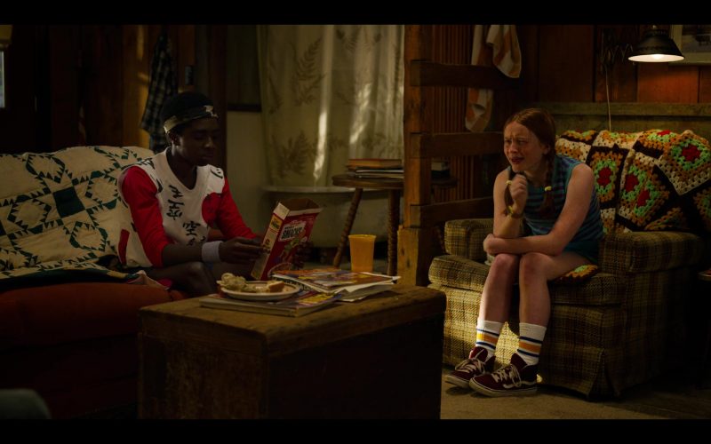 Kellogg's Honey Smacks Cereal Held by Caleb McLaughlin as Lucas Sinclair and Vans Sneakers Worn by Sadie Sink as Max Mayfield in Stranger Things – Season 3, Episode 6, “E Pluribus Unum” (2019) (Image 1)