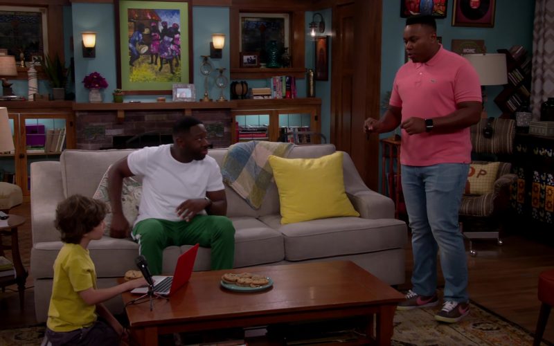 Lacoste Polo Shirt and Nike Shoes Worn by Marcel Spears as Marty in The Neighborhood Season 2 Episode 5 “Welcome to Soul Food” (2019) (Image 1)