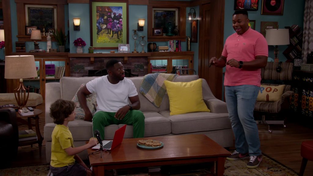 Lacoste Polo Shirt and Nike Shoes Worn by Marcel Spears as Marty in The Neighborhood Season 2 Episode 5 “Welcome to Soul Food” (2019) (Image 2)
