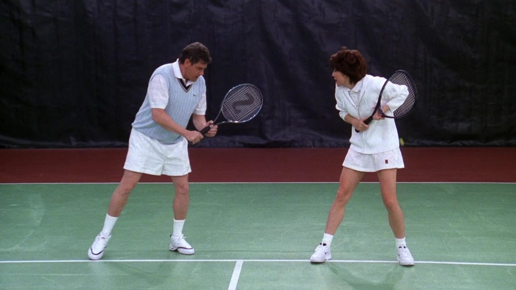 Lacoste Vest, Nike Tennis Skirt and Nike Sneakers and Silver Sports Racket in Friends Season 5 Episode 12 “The One with Chandler’s Work Laugh” (1999) (Image 1)