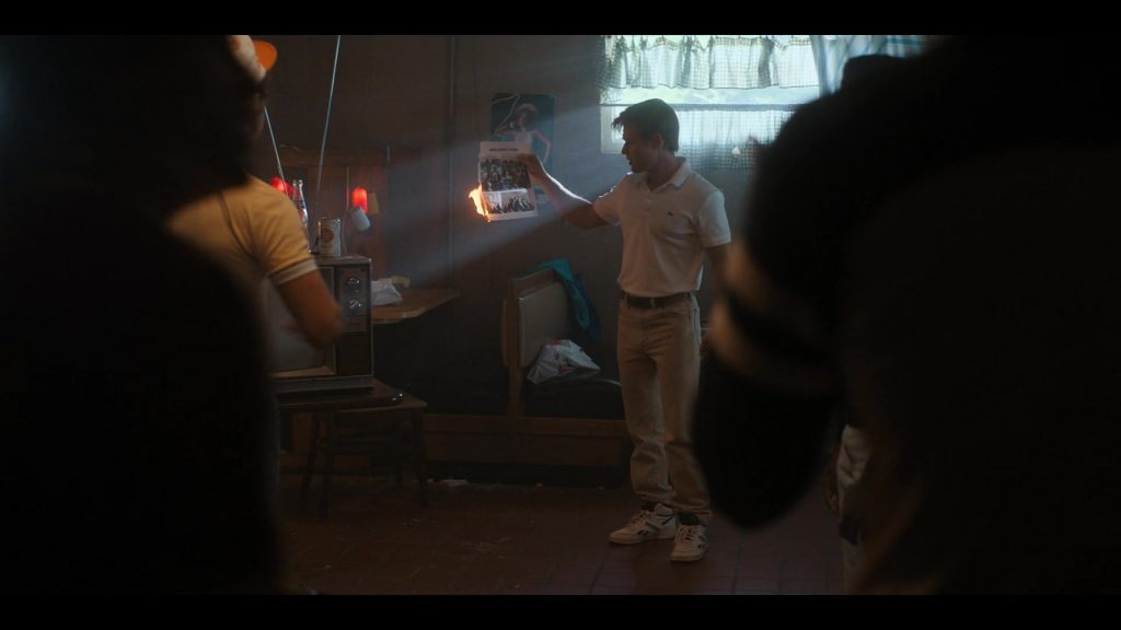 Lacoste White Polo Shirt and Reebok Sneakers of Mason Dye as Jason Carver in Stranger Things S04E02 “Chapter Two - Vecna's Curse” (2022) (Image 1)
