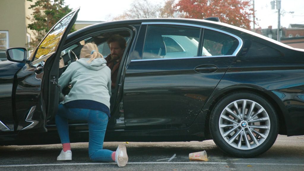 Levi's Jeans, Reebok Shoes, Dunkin' Coffee Drink in Tires S02E09 “The Radio Ad” (2025) (Image 1)