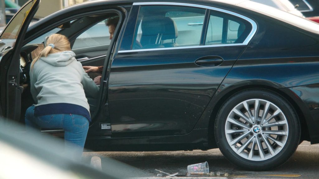 Levi's Jeans, Reebok Shoes, Dunkin' Coffee Drink in Tires S02E09 “The Radio Ad” (2025) (Image 11)
