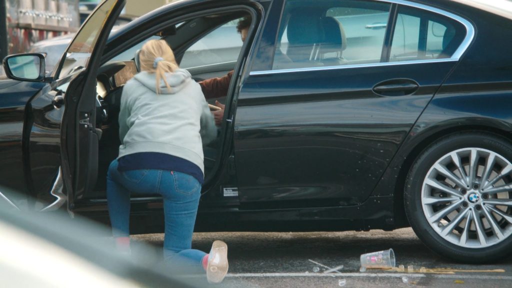 Levi's Jeans, Reebok Shoes, Dunkin' Coffee Drink in Tires S02E09 “The Radio Ad” (2025) (Image 17)