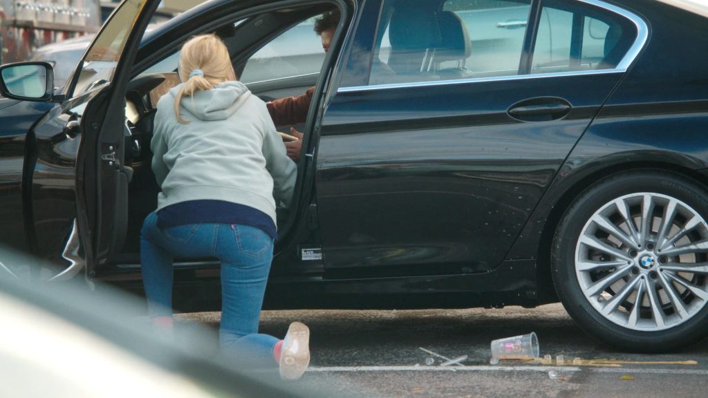 Levi's Jeans, Reebok Shoes, Dunkin' Coffee Drink in Tires S02E09 “The Radio Ad” (2025) (Image 18)