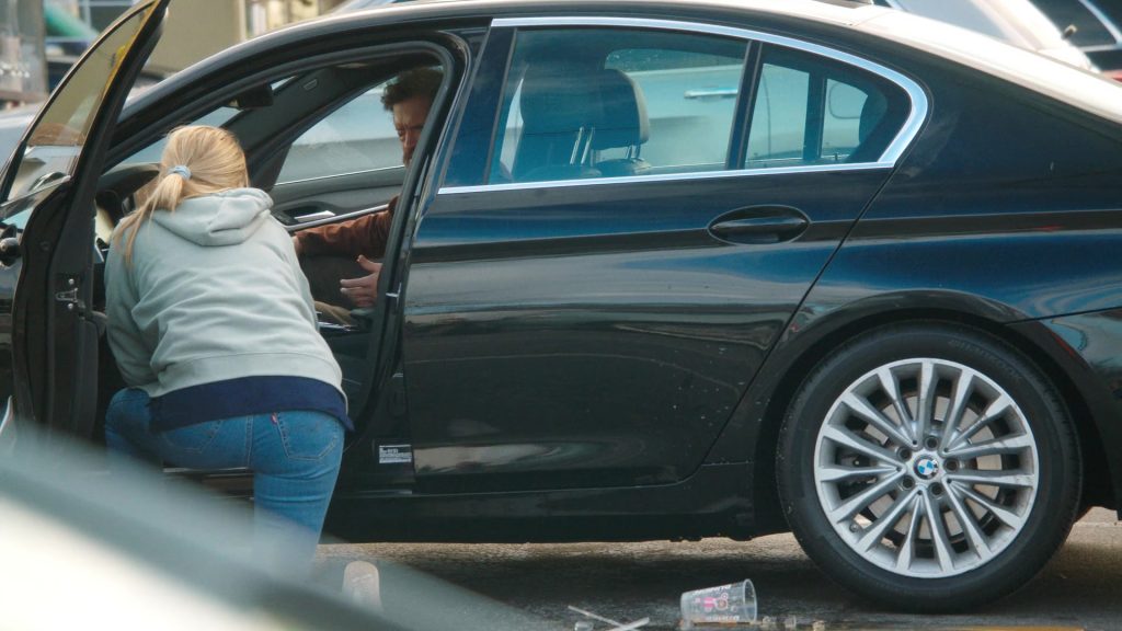 Levi's Jeans, Reebok Shoes, Dunkin' Coffee Drink in Tires S02E09 “The Radio Ad” (2025) (Image 21)