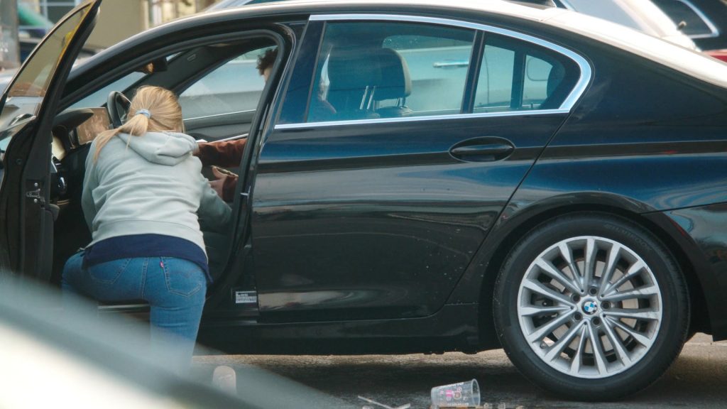 Levi's Jeans, Reebok Shoes, Dunkin' Coffee Drink in Tires S02E09 “The Radio Ad” (2025) (Image 4)