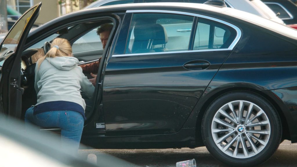 Levi's Jeans, Reebok Shoes, Dunkin' Coffee Drink in Tires S02E09 “The Radio Ad” (2025) (Image 5)