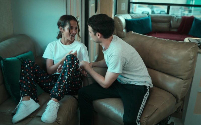 Louis Vuitton Trousers and Puma White Sneakers Worn by Alicia Vikander as Mira in Irma Vep S01E03 “Dead Man's Escape” (2022) (Image 1)