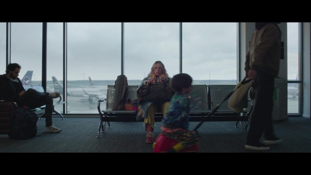 Lufthansa, Nike Shoes in Goodbye June (2025) (Image 1)
