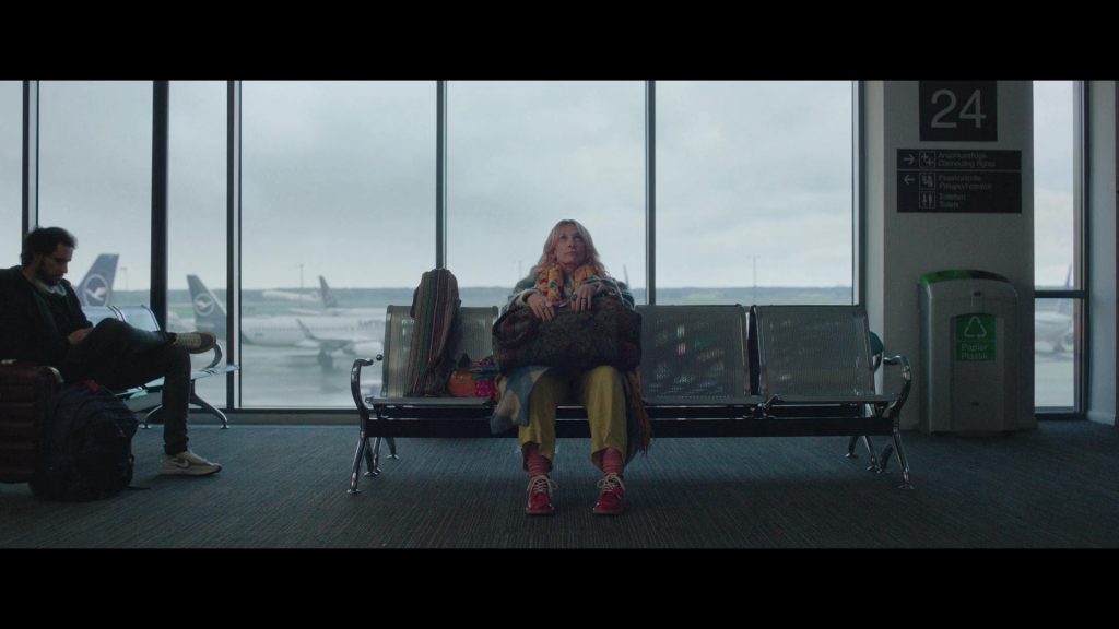 Lufthansa, Nike Shoes in Goodbye June (2025) (Image 4)
