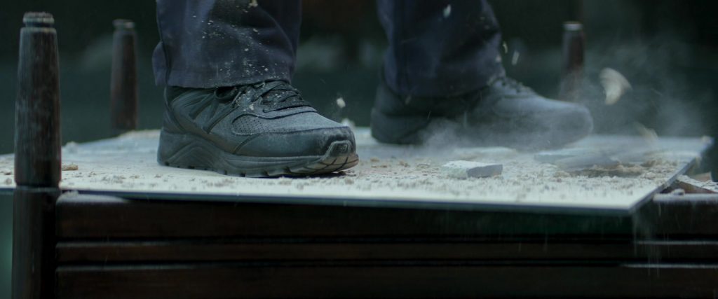 New Balance Black Sneakers Worn by Willem Dafoe as Nemo in Inside (2023) (Image 1)