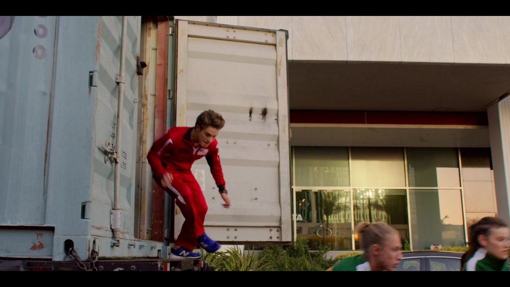 New Balance Blue Sneakers of Ricardo Hurtado as Tyler in Malibu Rescue - The Next Wave (2020) (Image 3)