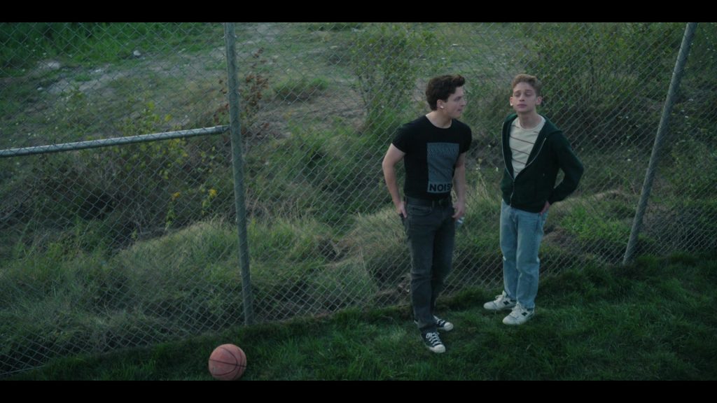 New Balance, Converse Shoes in The Institute S01E02 “Shot for Dots” (2025) (Image 4)
