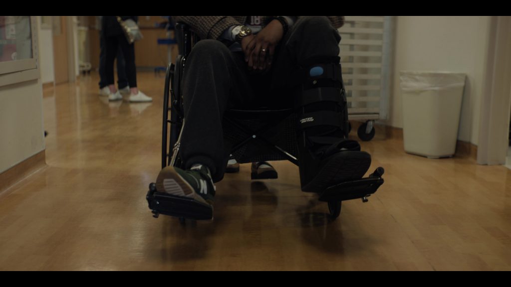 New Balance Shoes and United Ortho in Emperor of Ocean Park S01E10 (2024) (Image 3)
