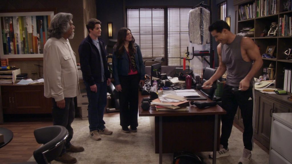 New Balance Sneakers, Adidas Pants, Adidas Shoes in Lopez vs Lopez S03E13 “Lopez vs Lockout” (2025) (Image 3)