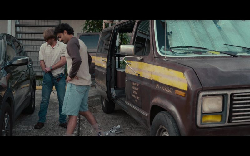New Balance Sneakers in Hit Man (2023) (Image 1)