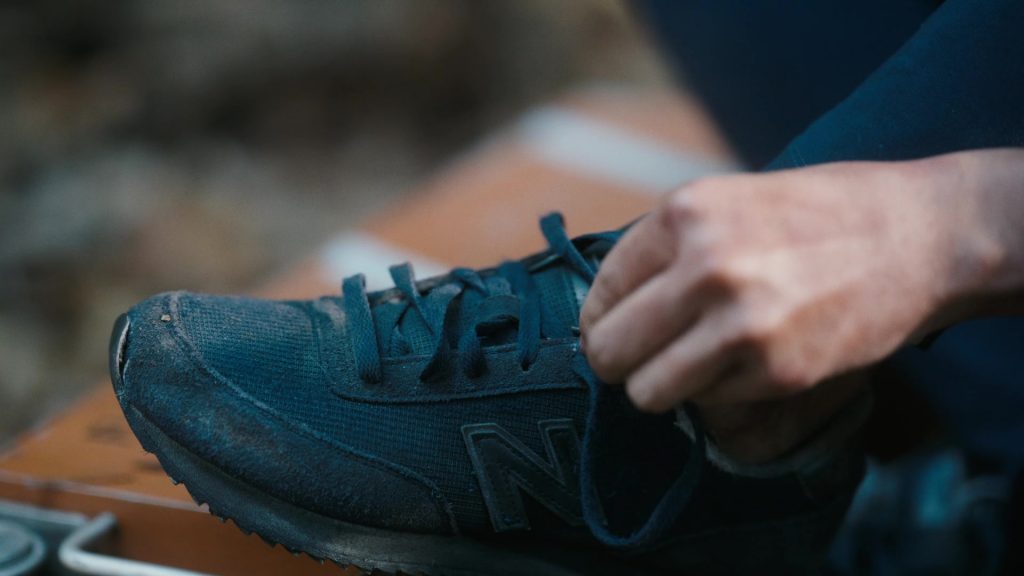 New Balance Women's Sneakers of Reign Edwards as Rachel Reid in The Wilds S02E05 “Day 45-16” (2022) (Image 1)