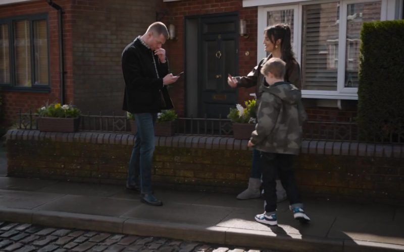 Next White-Blue touch fastening elastic lace trainers in Coronation Street S67E104 Episode 11866 (2026) (Image 1)