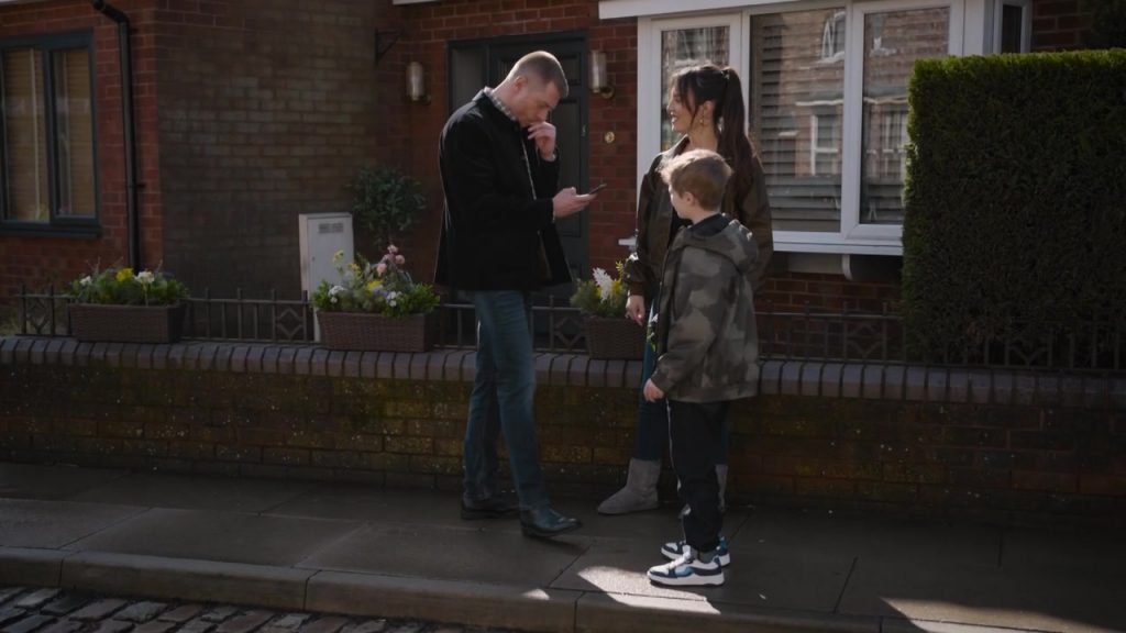 Next White-Blue touch fastening elastic lace trainers in Coronation Street S67E104 Episode 11866 (2026) (Image 3)