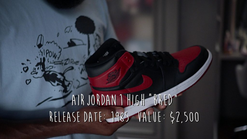 Nike Air Jordan 1 High ‘Bred' 1985 Men's Sneakers in Black-ish S08E07 “Sneakers by the Dozen” (2022) (Image 1)