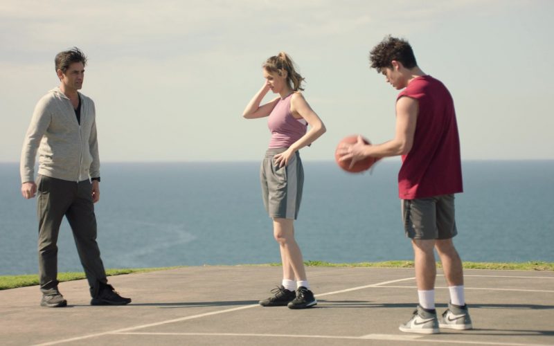Nike Air Jordan 1 Retro White-Grey Sneakers in Big Shot S01E02 “The Marvyn Korn Effect” (2021) (Image 1)