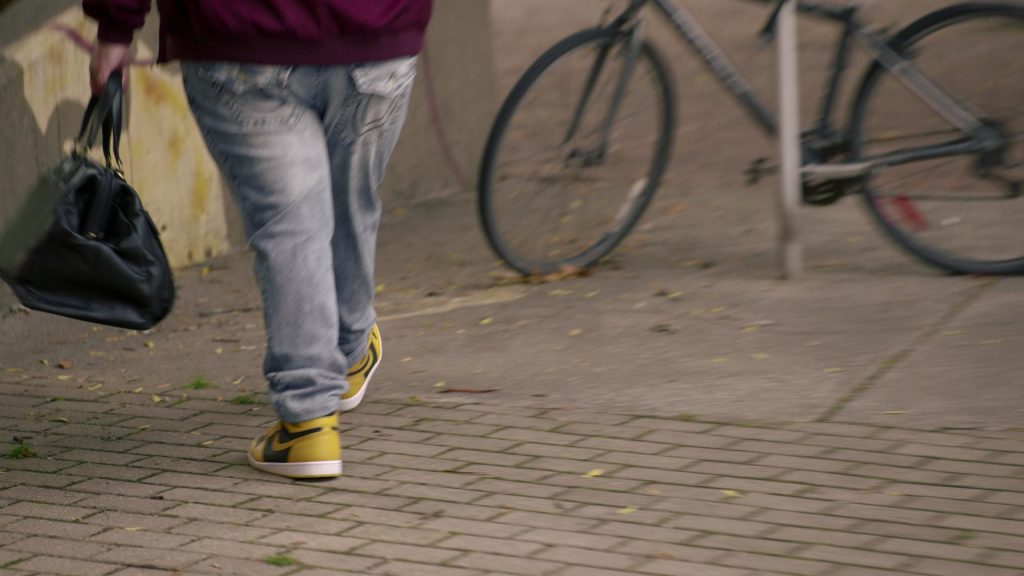 Nike Air Jordan 1 Yellow Black Sneakers Worn by Harvey Guillén as Guillermo de la Cruz in What We Do in the Shadows S04E05 “Private School” (2022) (Image 1)