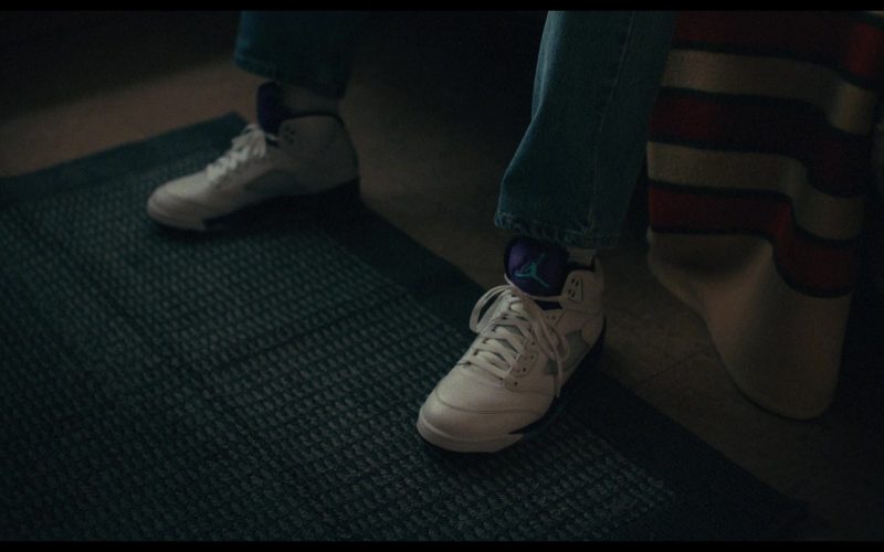 Nike Air Jordan 5 Retro OG “Grape” sneakers in white with purple and emerald green accents in Bad Thoughts S02E01 “Bad Impulses” (2026) (Image 1)
