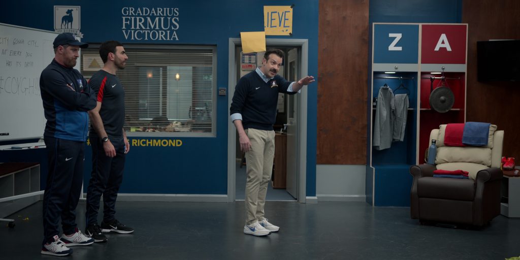 Nike Air Zoom Sneakers of Jason Sudeikis, New Balance Shoes of Brendan Hunt as Coach Beard, Nike Black Sneakers and Clothes of Brett Goldstein as Roy Kent in Ted Lasso S03E05 “Signs” (2023) (Image 2)
