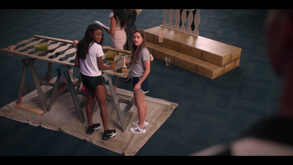 Nike Air Zoom SuperRep 2 Sneakers of Imani Lewis as Calliope ‘Cal' Burns and Adidas Shoes of Sarah Catherine Hook as Juliette Fairmont in First Kill S01E05 “First Love” (2022) (Image 1)