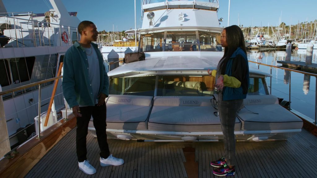 Nike AirMax 90 Sneakers of Kayla Smith as Kamran ‘Kam' Hanna in NCIS - Los Angeles S12E12 “Can't Take My Eyes off You” (2021) (Image 1)