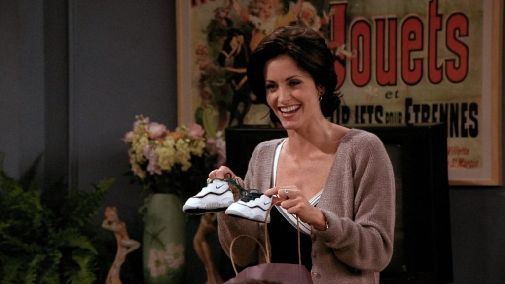 Nike Baby Boy's Sneakers Held by Courteney Cox (Monica Geller) in Friends Season 2 Episode 1 “The One with Ross’s New Girlfriend” (1995) (Image 1)
