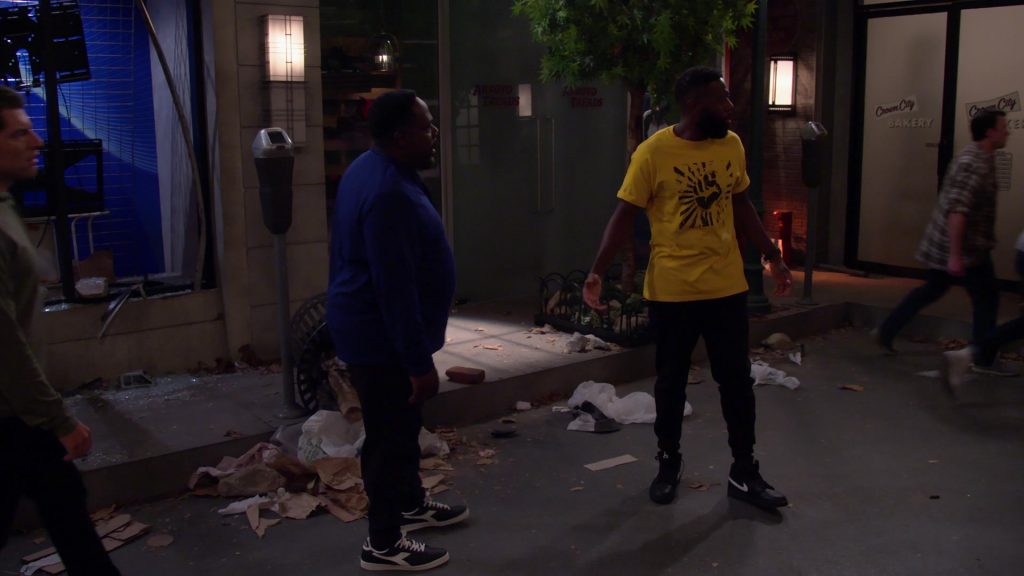 Nike Black Sneakers of Sheaun McKinney as Malcolm in The Neighborhood S03E01 “Welcome to the Movement” (2020) (Image 1)