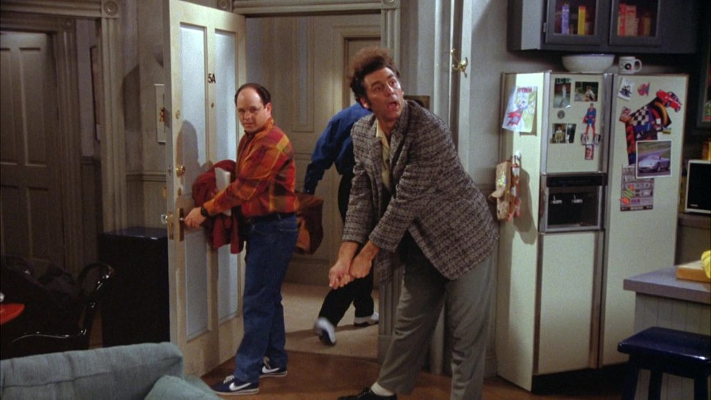 Nike Blue Shoes White Logo Worn by Jason Alexander as George Costanza in Seinfeld Season 5 Episode 14 “The Marine Biologist” (1994) (Image 1)