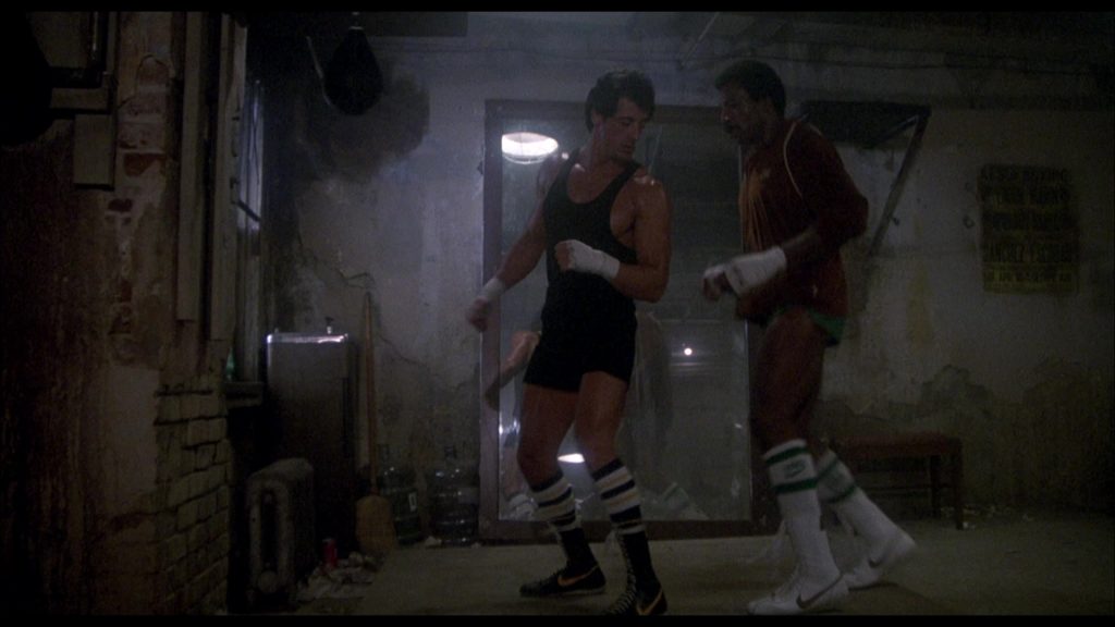 Nike Boxing Black Shoes Worn by Sylvester Stallone (Rocky Balboa) and Nike White Boots Worn by Carl Weathers (Apollo Creed) in Rocky 3 (1982) (Image 1)