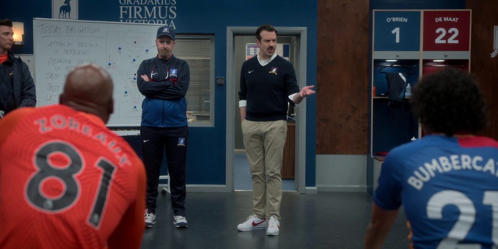 Nike Cortez Shoes and Sweater Worn by Jason Sudeikis in Ted Lasso S03E09 “La Locker Room Aux Folles” (2023) (Image 1)