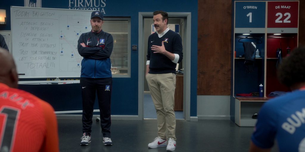 Nike Cortez Shoes and Sweater Worn by Jason Sudeikis in Ted Lasso S03E09 “La Locker Room Aux Folles” (2023) (Image 2)