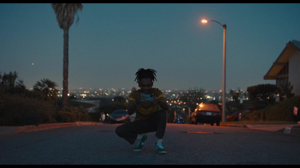 Nike Green Sneakers and Apple iPhone of Tyrel Jackson Williams as Terrell in Hollywood Stargirl (2022) (Image 1)
