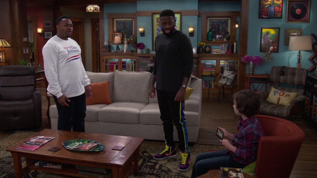 Nike Jordan 1 Colored High Top Sneakers of Sheaun McKinney as Malcolm in The Neighborhood S03E02 “Welcome to the Election” (2020) (Image 1)
