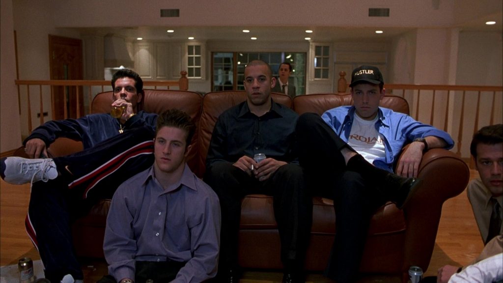 Nike Jordan Sneakers and Nike Pants Worn by Nicky Katt, Hustler Cap and Trojan T-Shirt Worn by Ben Affleck and Miller Beer in Boiler Room (2000) (Image 1)